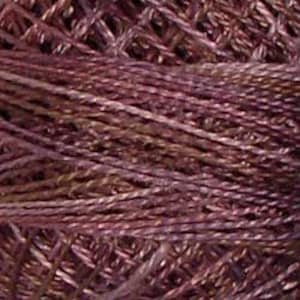 May include: Close-up of a deep purple yarn with a subtle sheen. The yarn is made of a blend of fibers, creating a textured look.