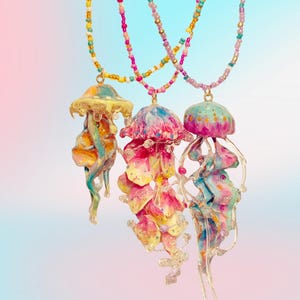 Original long-style earrings featuring clear handmade jellyfish earrings with ear clips, Japanese-style creative resin earrings.