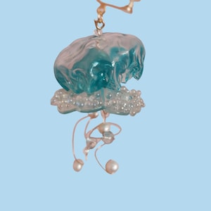 Original long-style earrings featuring clear handmade jellyfish earrings with ear clips, Japanese-style creative resin earrings.
