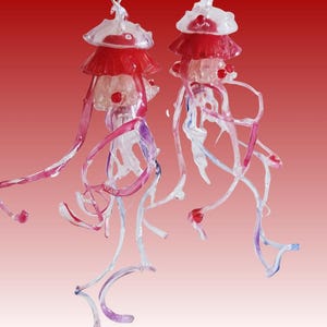 Original long-style earrings featuring clear handmade jellyfish earrings with ear clips, Japanese-style creative resin earrings.