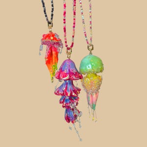 Original long-style earrings featuring clear handmade jellyfish earrings with ear clips, Japanese-style creative resin earrings.