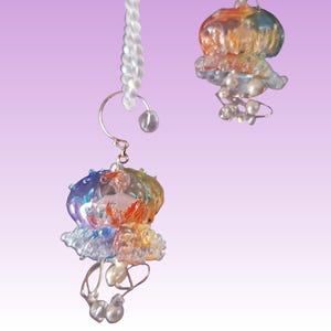 Original long-style earrings featuring clear handmade jellyfish earrings with ear clips, Japanese-style creative resin earrings.