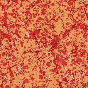 May include: A red and orange marbled paper with a repeating pattern of red and orange circles.
