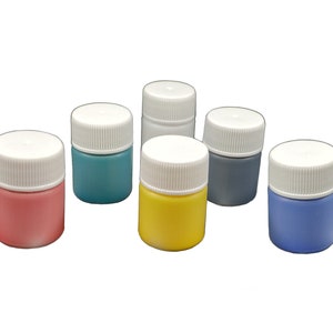 6 plastic jars of marbling paint, in red, yellow, blue, black, white and green colors