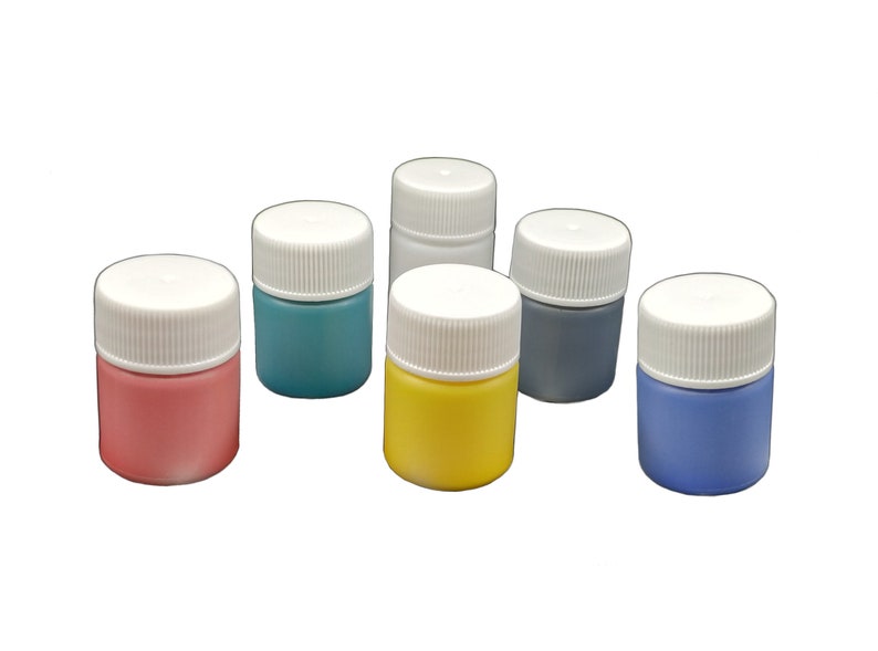 6 plastic jars of marbling paint, in red, yellow, blue, black, white and green colors