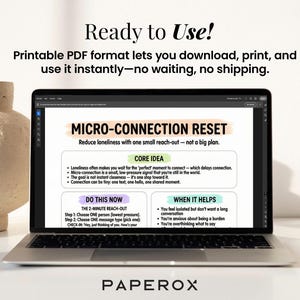 May include: A laptop displays a "MICRO-CONNECTION RESET" guide, offering steps to reduce loneliness. The screen text includes "Core Idea" and "Do This Now" sections. A beige vase sits to the left. The text "Ready to Use!" is at the top.