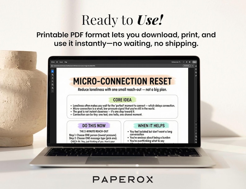 May include: A laptop displays a "MICRO-CONNECTION RESET" guide, offering steps to reduce loneliness. The screen text includes "Core Idea" and "Do This Now" sections. A beige vase sits to the left. The text "Ready to Use!" is at the top.