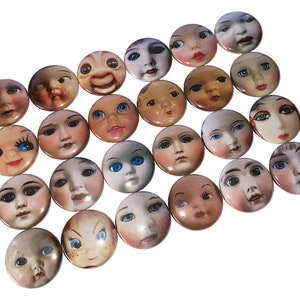May include: A collection of 20 round button pins featuring various doll faces with different expressions and hairstyles. The buttons are all white with a glossy finish and have a diameter of approximately 1 inch.