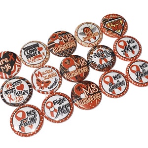 May include: A set of 14 orange and black button pins with various designs and text related to multiple sclerosis awareness. The text includes "Cure MS", "MS Awareness", "Fighting Back Cure MS", "MS Hope", "MS Believe", "MS Survivor", "MS Faith", "Peace Love Cure MS", "Multiple Sclerosis Awareness", "Boom Fight MS".