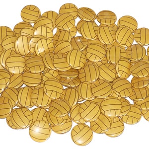 May include: A large group of gold volleyball buttons. The buttons are all the same size and shape, and they feature a black outline of a volleyball.