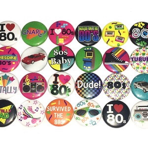 May include: A collection of 18 round buttons with various 1980s themed designs. The buttons feature bright colors, bold graphics, and text such as "I Love 80s", "Gnarly", "80s Baby", "Totally Rad", "Dude!" and "I Survived the 80s".