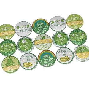 May include: A collection of 14 round green and yellow buttons with various St. Patrick's Day themed designs. The buttons feature text such as "Happy St. Patrick's Day", "Luck o' the Irish", and "St. Paddy's Day".
