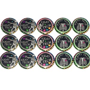 May include: Twelve 1-inch diameter button pins with a black background and colorful accents.  Half of the buttons feature a skeleton holding a heart with the text "XRAY TECH". The other half of the buttons feature a ribcage with a heart and the text "XRAY TECH".
