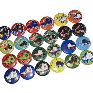 May include: A collection of 18 colorful round buttons featuring roller skate designs. The buttons have various phrases including "Let's Roll!" and "Skate!"