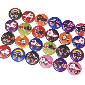 May include: A collection of 20 colorful round pinback buttons featuring roller skate designs. The buttons have various colors, including red, blue, green, yellow, orange, black, and white. Some buttons feature hearts, rainbows, and stars.