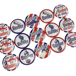 May include: A collection of 12 round, red, white, and blue barber shop themed buttons. The buttons feature various images and text, including a barber pole, a barber chair, a pair of scissors, a razor, and the words "Barber", "Warning Barber with attitude", and "Keep Calm I'm a Barber".