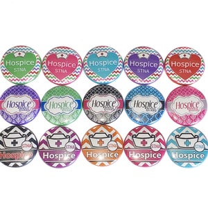 May include: A collection of fifteen round Hospice STNA buttons. Each button features the word "Hospice" and "STNA" in white text. The buttons have various background patterns and colors, including green, pink, blue, purple, and orange.
