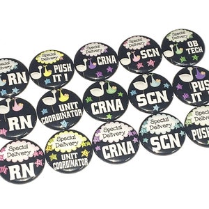 May include: A set of 15 black and white button pins with various designs related to a hospital labor and delivery unit. The pins feature storks, babies, and text such as "Special Delivery", "RN", "CRNA", "SCN", "Unit Coordinator", and "Push It!"