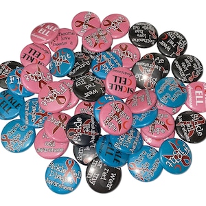 May include: A collection of round, colorful buttons with various messages and designs related to sickle cell disease awareness. The buttons feature phrases like "Sickle Cell Awareness", "Fight", "Always Have Hope", and "I Wear Red For My Friend". Some buttons also include a red ribbon, a symbol of sickle cell disease awareness.