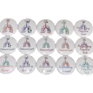 May include: Twelve 1-inch button pins featuring a stylized watercolor illustration of lungs with flowers. The pins have different text, including "Pulmonologist", "Respiratory Therapist", and "Pulmonary Function Tech".