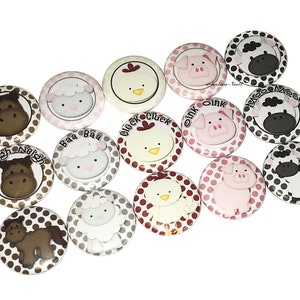 May include: A set of 12 farm animal themed buttons with polka dot backgrounds. The animals include a cow, pig, chicken, horse, and sheep. Each button has a different color background and features a different animal with a sound associated with it.