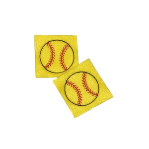 May include: Two yellow square patches with embroidered softball designs. Each patch features a black outline of a softball with red stitching details. The patches are set against a white background.