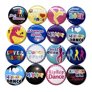 May include: Set of 16 colorful round buttons with various dance-themed designs. The buttons feature phrases like "Just Dance", "Dance with me", "Hip Hop Dance", and "I Love 2 Dance".