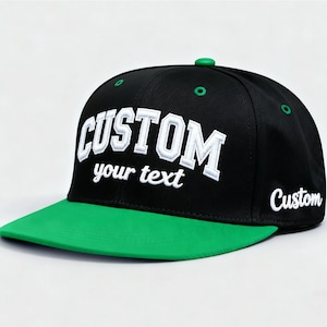 May include: Black and green custom baseball cap. The cap features the word "CUSTOM" in white, with "your text" below it. The brim is green, and the word "Custom" is on the side.