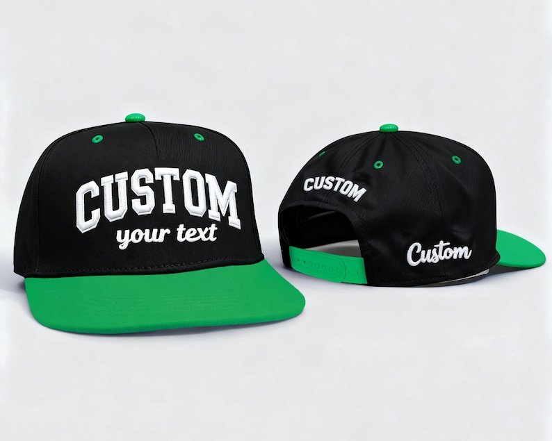 May include: Black and green custom baseball cap with the word "CUSTOM" in white block letters on the front. The cap has a green brim and a green button on top. The back of the cap also has the word "CUSTOM" in white.