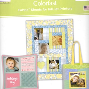 May include: A package of Colorfast fabric sheets for ink jet printers. The package features a sample quilt, pillow, and tote bag with photos. The quilt has a blue, yellow, and white floral pattern. The pillow has a photo of a baby.