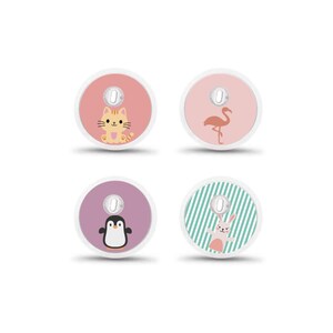 May include: Four round, white devices with colorful, illustrated designs. Each has a central, silver-colored button. The designs include a cat, flamingo, penguin, and a bunny with green and white striped background.