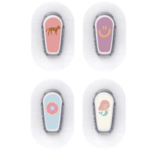 May include: Four adhesive patches with decorative designs. One features a pink background with a leopard, another a purple background with a smiley face, a third a blue background with a donut, and the last a white background with a mermaid.