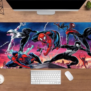 May include: A rectangular mouse pad featuring multiple Spider-Man characters in action poses against a cityscape backdrop. The pad showcases a vibrant color palette of red, blue, black, and white, with a dynamic comic book style.