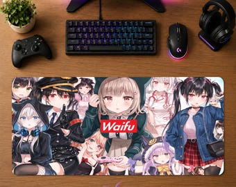 May include: A rectangular desk mat featuring a collage of various anime-style characters in diverse outfits, including a central figure wearing a dark green hoodie with a red rectangular logo that reads Waifu in white text.