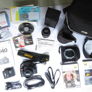 New Nikon D40+Lenses+Travel Bag+DVDs + Manual + Flash + Charger + Battery + Cords