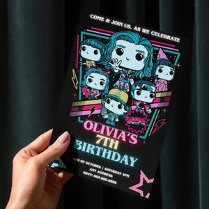 May include: Black birthday invitation with cartoon characters and the text "Olivia's 7th Birthday." The invitation includes the date, time, and RSVP information. The design features neon colors and a fun, celebratory theme.
