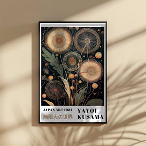 May include: Framed art print featuring a stylized floral design in shades of gold, orange, and green against a dark background. The artwork includes text that reads "JAPAN ART 1924" and "YAYOI KUSAMA" with Japanese characters.