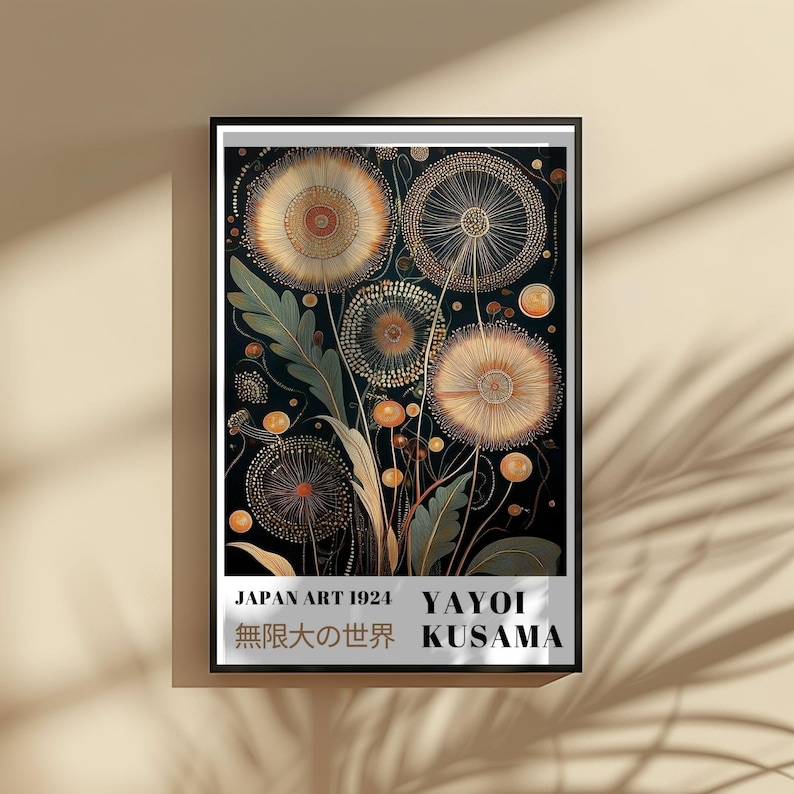 May include: Framed art print featuring a stylized floral design in shades of gold, orange, and green against a dark background. The artwork includes text that reads "JAPAN ART 1924" and "YAYOI KUSAMA" with Japanese characters.