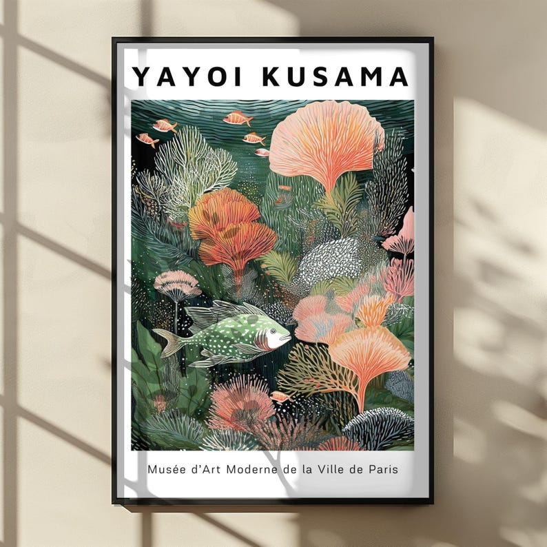 May include: Framed art print featuring a vibrant underwater scene with coral, fish, and the text "YAYOI KUSAMA." The artwork showcases a variety of colors, including orange, green, and pink, with the text "Mus&eacute;e d'Art Moderne de la Ville de Paris" at the bottom.