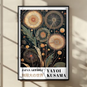 May include: Framed art print featuring a stylized floral design in shades of gold, orange, and green against a dark background. The artwork includes the text "JAPAN ART 1924" and "YAYOI KUSAMA" in a white rectangular box. The Japanese text is also included.