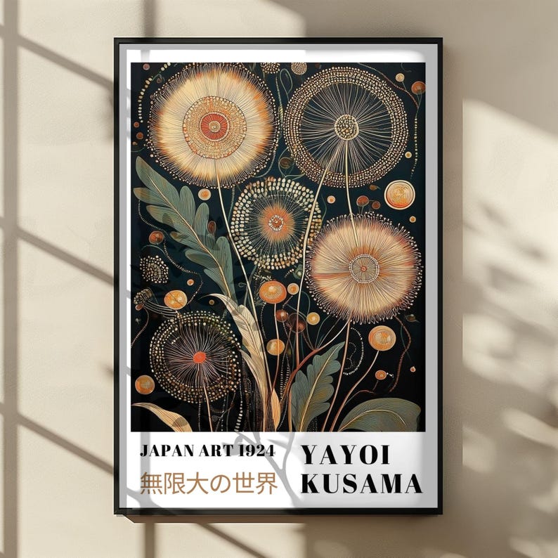 May include: Framed art print featuring a stylized floral design in shades of gold, orange, and green against a dark background. The artwork includes the text "JAPAN ART 1924" and "YAYOI KUSAMA" in a white rectangular box. The Japanese text is also included.