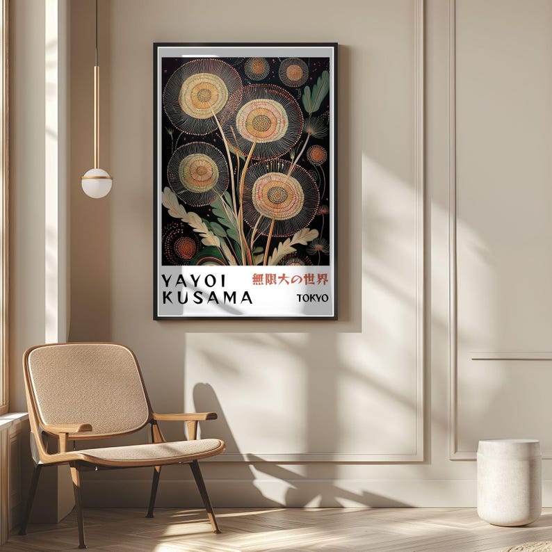 May include: A framed art print featuring a floral design with a black background. The artwork includes circular flower shapes in shades of yellow and gold, with green foliage. The print has text that reads "YAYOI KUSAMA 無限大の世界 TOKYO".