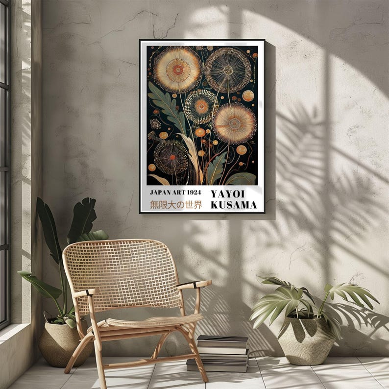 May include: A framed art print featuring a botanical illustration of dandelion-like flowers in shades of gold and brown against a dark background. The print includes the text "JAPAN ART 1924 YAYOI KUSAMA" in a white rectangular box.
