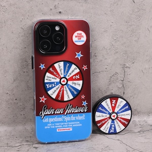 May include: A red and blue phone case with a "Wheel of Answers" design, featuring a spinning wheel with "Yes" and "No" options. Includes a matching pop socket. The case has the text "Spin an Answer".