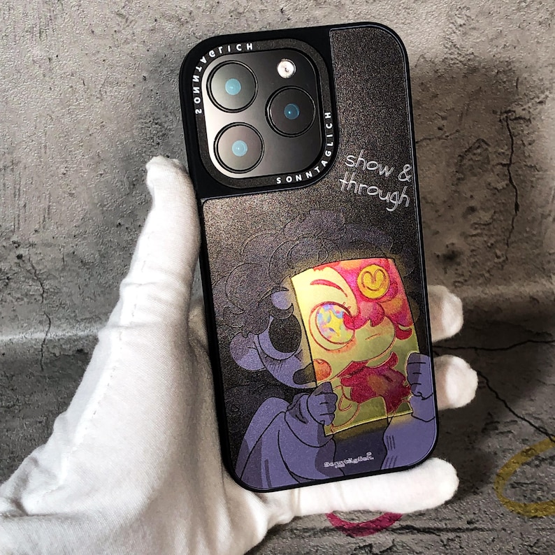 This Show & Through Silk Texture Acrylic iPhone Case offers a perfect blend of style and protection for your device. Designed with a premium silk-textured acrylic backplate and a durable silicone bumper, this case ensures excellent shock resistance, scratch protection, and a secure grip. The original illustration is created using cutting-edge G6 Ricoh high-precision printing, and the case features a "show & through" design that glows when backlit.