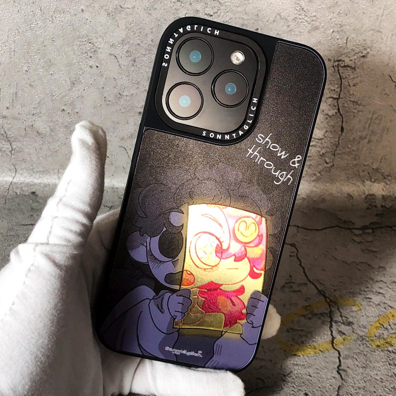 Show & Through Silk Texture Acrylic iPhone Case with semi-transparent acrylic backplate and soft silicone bumper. This phone case combines high-end art design with superior protection. The unique silk-textured backplate is mirrored using an electroplating process, adding a sleek and glossy finish to your iPhone. Ideal for those who appreciate custom artwork, it’s designed with a high-precision G6 Ricoh print to showcase an original illustration.