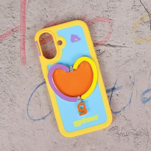 May include: Yellow and blue phone case with a heart-shaped design. The case features a yellow border, a light blue center, and a heart-shaped accent in purple, orange, and yellow. The text "ggshare" is visible.