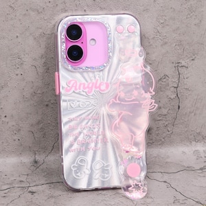 May include: Clear phone case with a pink camera frame and a pink cartoon character design. The case has the word "Angle" in pink script and the text "Tiny wins, big stars, the world is brighter with you."