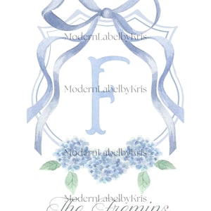 May include: Watercolor design featuring a light blue monogram letter "F" within a shield shape, adorned with a ribbon, hydrangeas, and the text "ModernLabelbyKris" and "The Fremins". The design has a soft, elegant aesthetic.