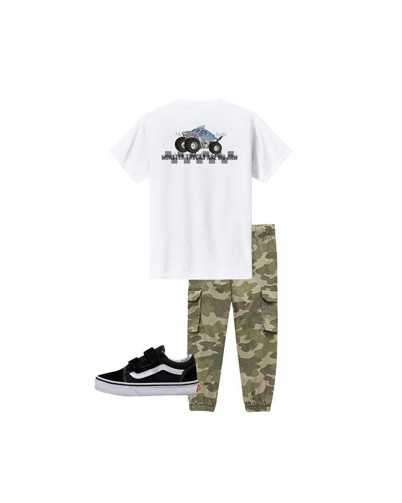 May include: A white t-shirt with a monster truck graphic, paired with camouflage cargo pants and black and white sneakers. The shirt features the text "MONSTER TRUCKS ARE MY JAM". A casual outfit for everyday wear.